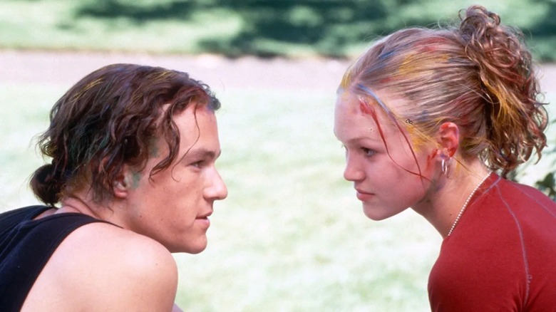 Patrick and Kat staring at each other with paint in their hair in 10 Things I Hate About You