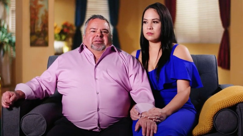 Big Ed and Liz sitting on a couch during a confessional in "90 Day Fiancé"