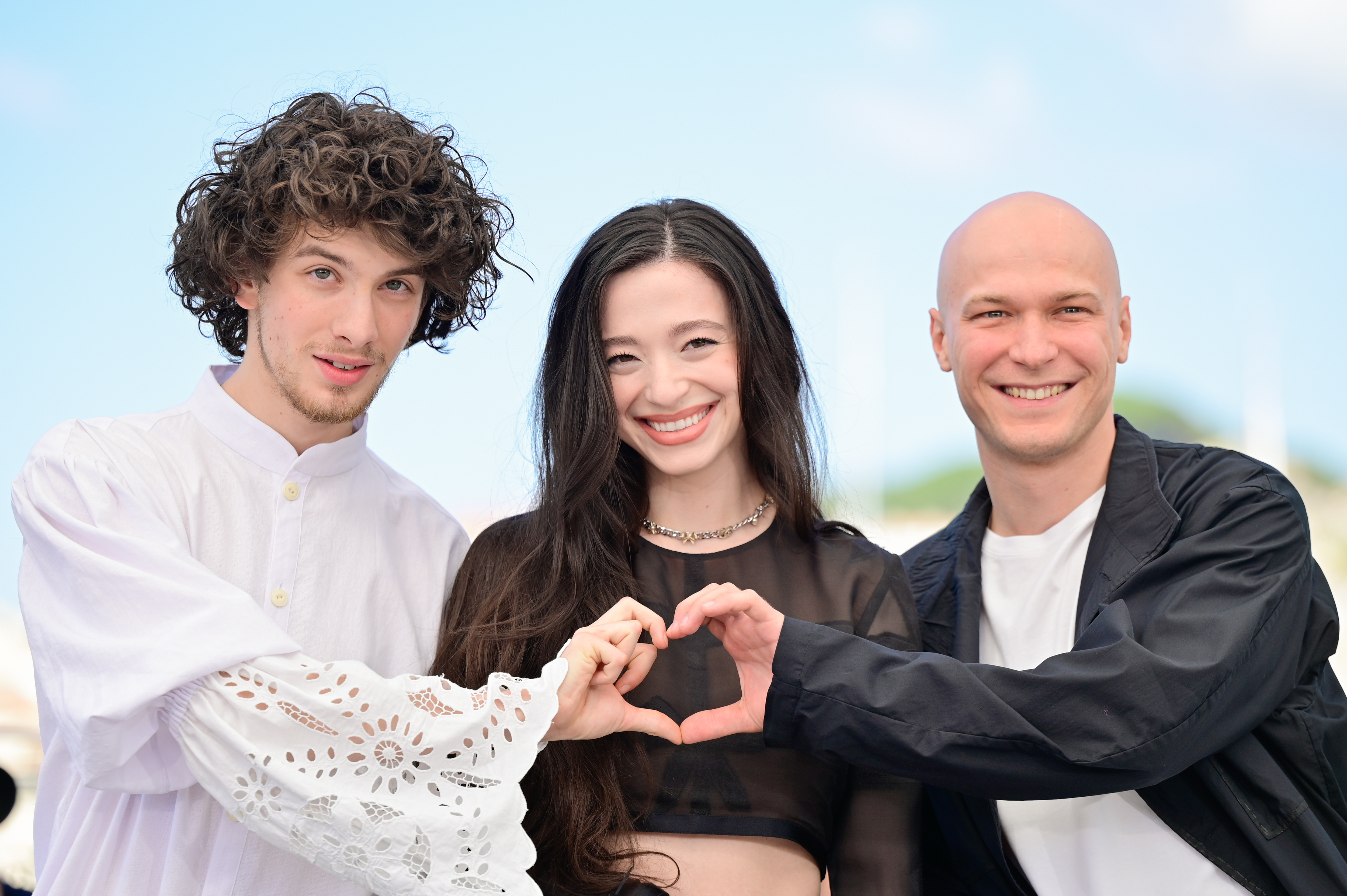 CANNES, FRANCE - MAY 22: Mark Eydelshteyn, Mikey Madison and Jurij Borisov attend the "Anora" Photocall at the 77th annual Cannes Film Festival at Palais des Festivals on May 22, 2024 in Cannes, France. (Photo by Stephane Cardinale - Corbis/Corbis via Getty Images)