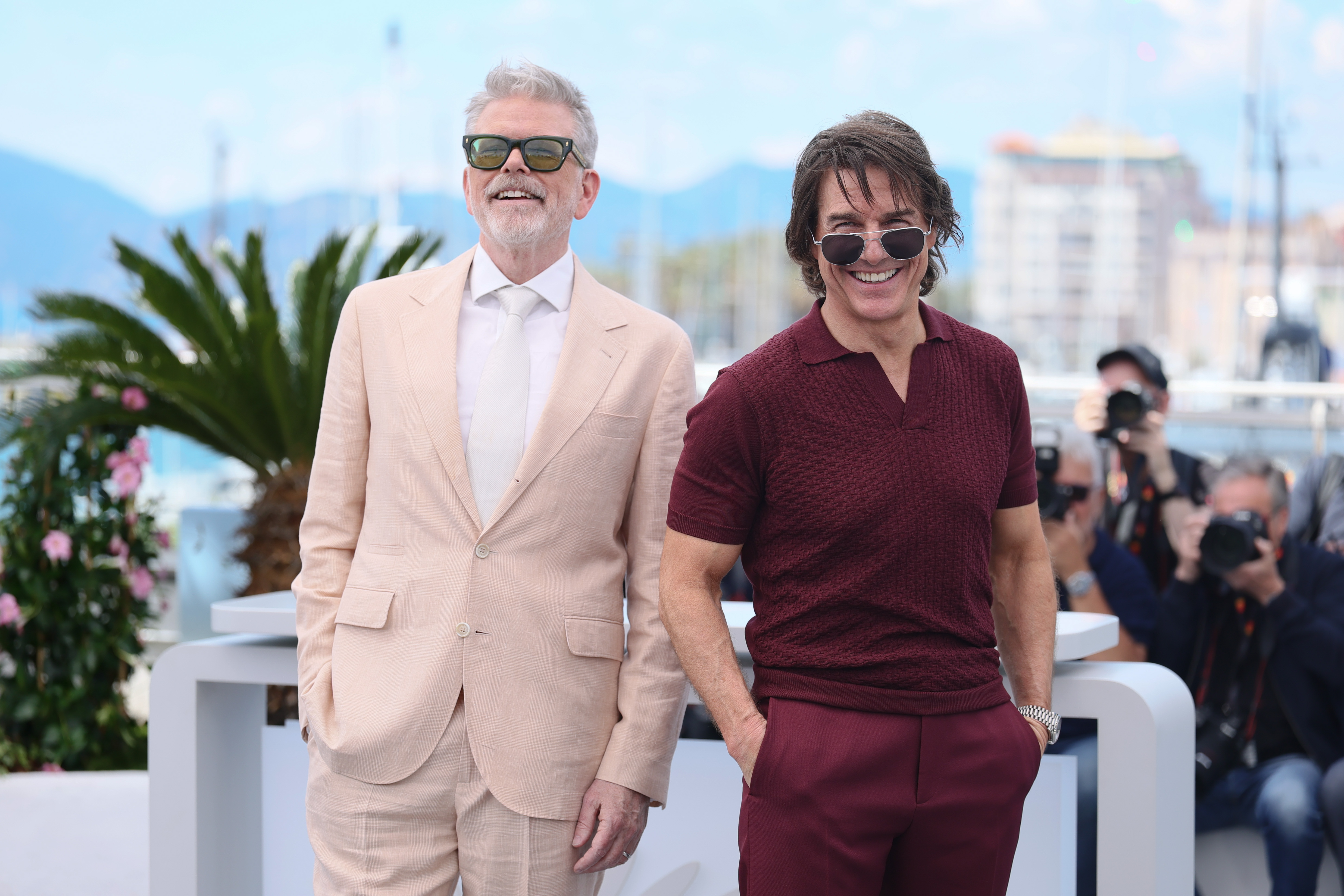 Christopher McQuarrie and Tom Cruise attend the 'Mission Impossible - The Final Reckoning' photocall at the 78th annual Cannes Film Festival at Palais des Festivals on May 14, 2025 in Cannes, France.