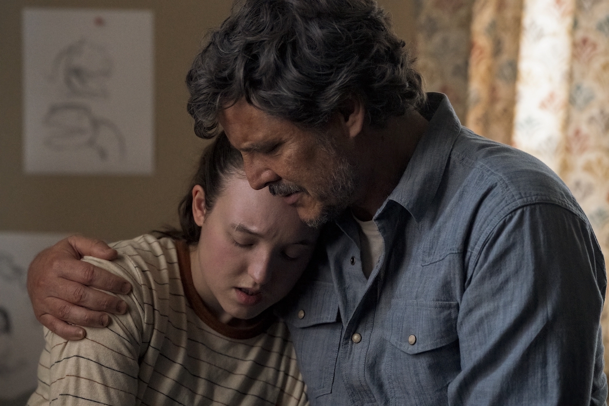 Bella Ramsey and Pedro Pascal in 'The Last of Us' Season 2 Episode 6, Joel holds Ellie in her room, comforting her