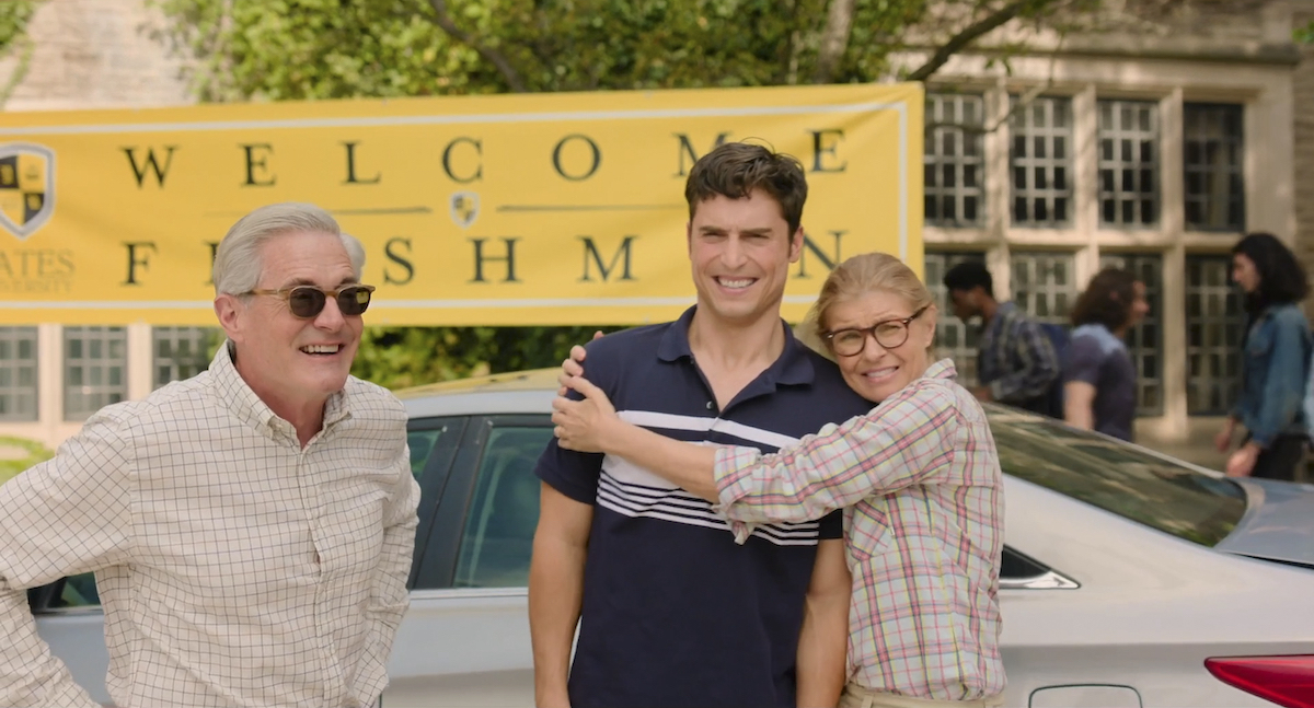 Kyle MacLachlan, Benny (Benito Skinner), Connie Britton in OVERCOMPENSATING, the Amazon series, shown here dropping Benny off at school (his mom is hugging him awkwardly)