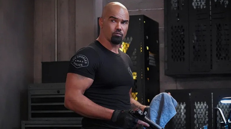 Hondo listening in an evidence locker in "S.W.A.T."