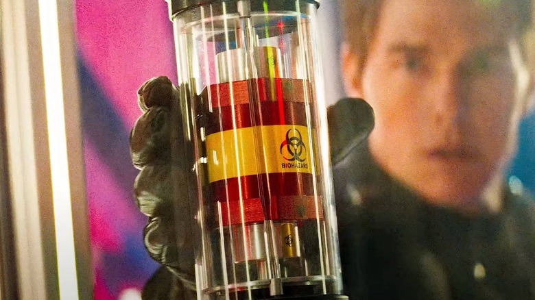 Ethan Hunt reaching for the rabbit's foot in Mission: Impossible III (2006)