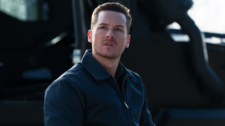 Wesley "Wes" Mitchell looking up in "FBI: International"