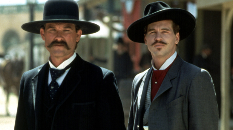 Doc Holliday and Wyatt Earp stare in "Tombstone" (1993)
