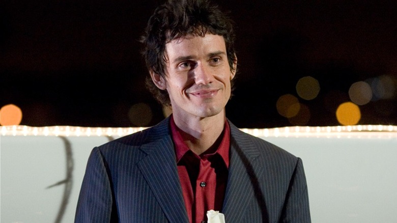 Brian Moser smiles menacingly at someone in "Dexter" (2006)