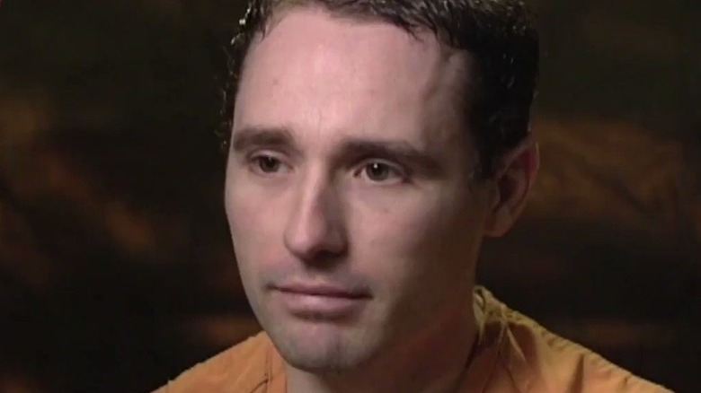 Skylar Deleon wears an orange prison uniform