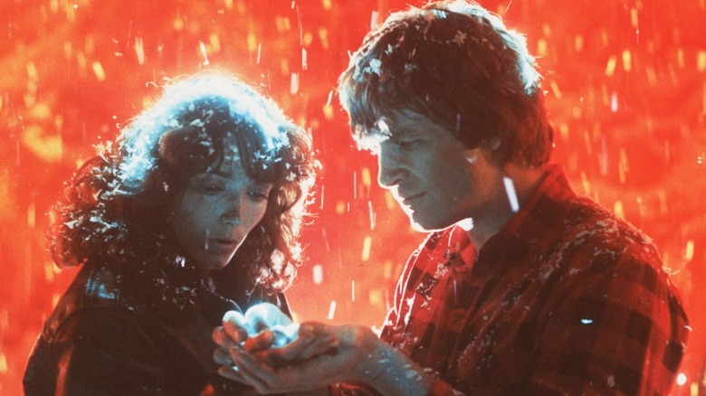 Starman giving Jenny his last sphere in "Starman"