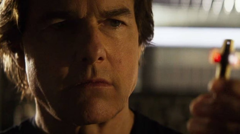 Ethan Hunt holding the Entity's key in Mission: Impossible - The Final Reckoning
