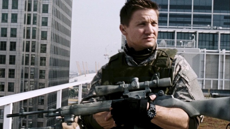 Doyle stands on a rooftop holding a rifle in "28 Weeks Later" (2007)