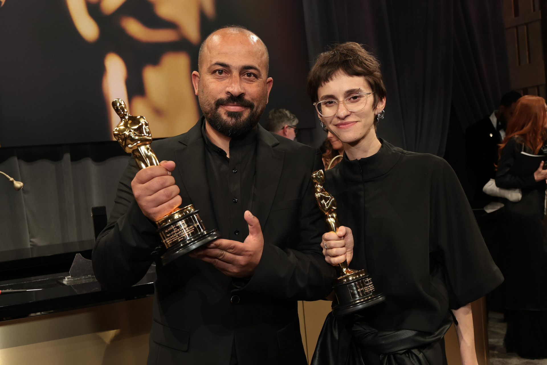 HOLLYWOOD, CALIFORNIA - MARCH 02: (L-R) Hamdan Ballal and Rachel Szor, winners of the Best Documentary Feature Film for "No Other Land", attend the 97th Annual Oscars Governors Ball at Ovation Hollywood Complex on March 02, 2025 in Hollywood, California. (Photo by Monica Schipper/Getty Images)