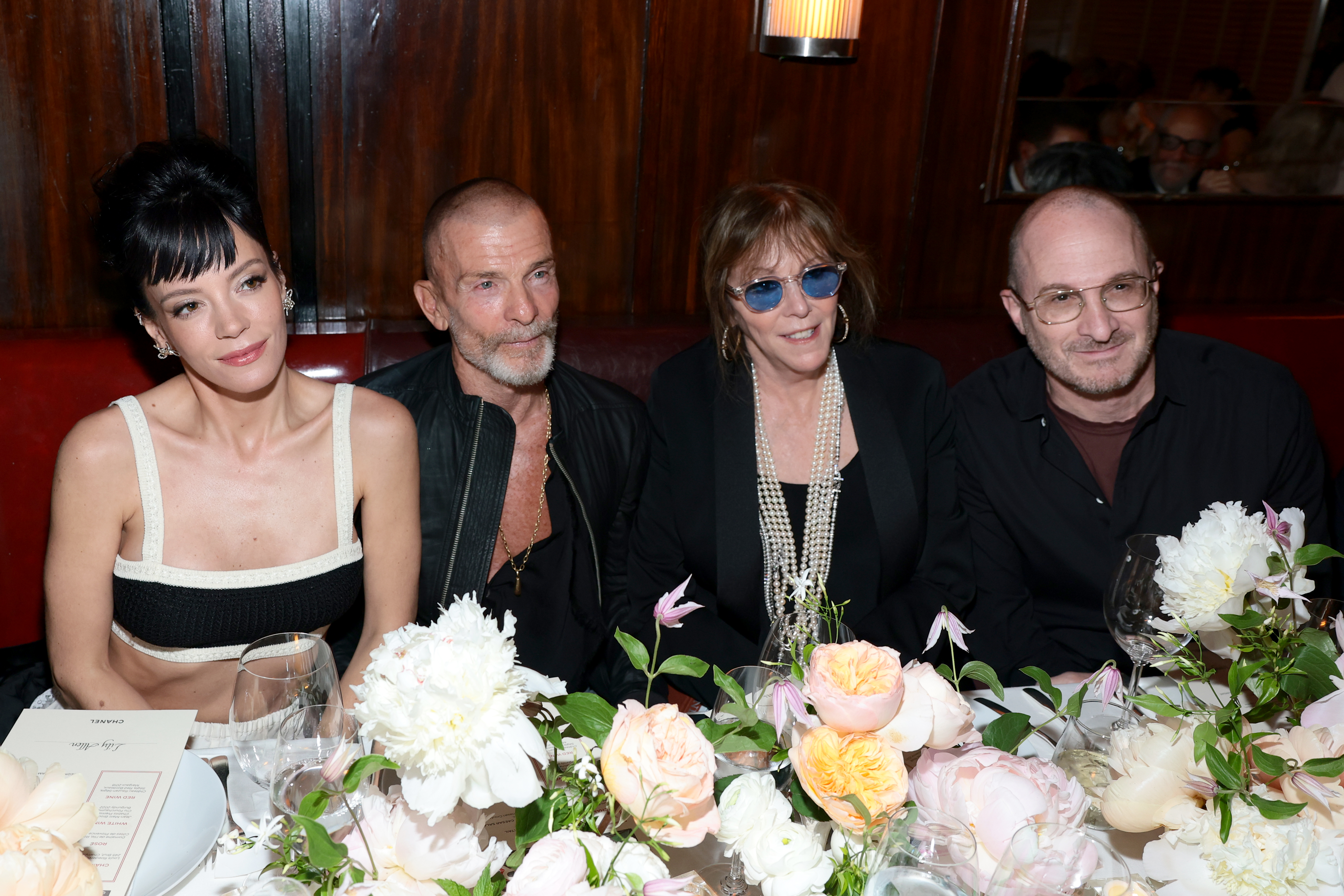 NEW YORK, NEW YORK - JUNE 09: (L-R) Lily Allen, wearing CHANEL, Vivi Nevo, Jane Rosenthal, wearing CHANEL, and Darren Aronofsky attend the CHANEL Tribeca Festival Artists Dinner at The Odeon on June 09, 2025 in New York City. (Photo by Dimitrios Kambouris/WireImage)