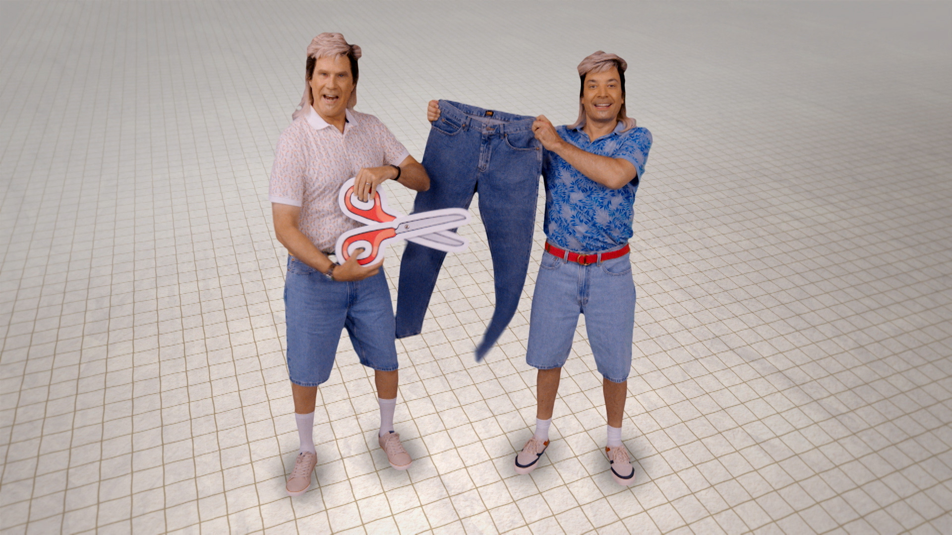 Jimmy Fallon and Will Farrell holding a pair of jeans and a pair of giant scisors in a white tiled void on 'The Tonight Show'