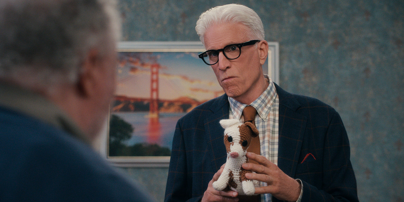 A Man on the Inside. Ted Danson as Charles, shown here holding a small stuffed dog made of crochet