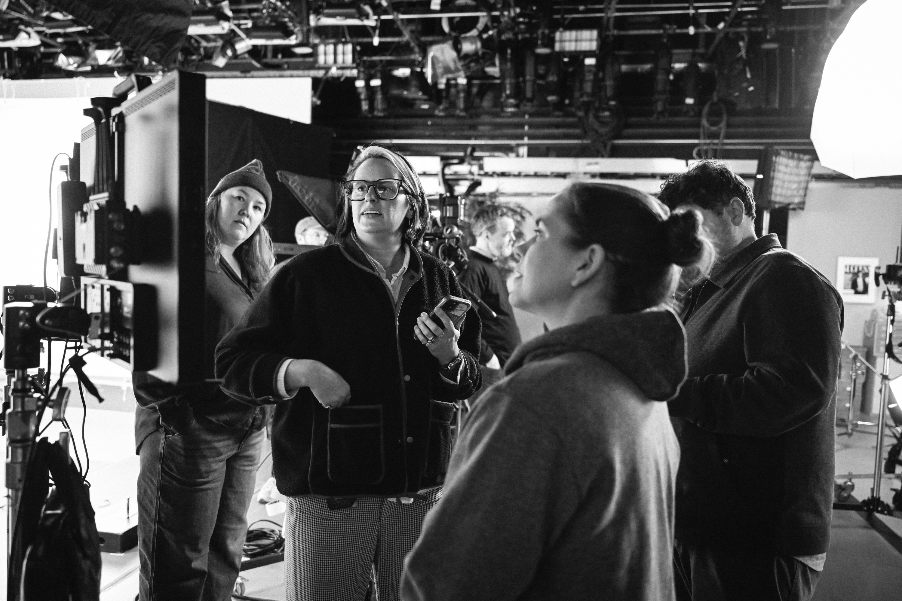Black and white photo showing the production crew of 'The Tonight Show' looking at a video monitor