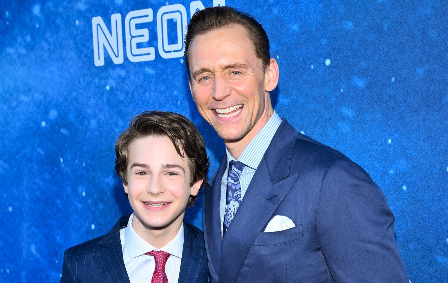 Benjamin Pajak, Tom Hiddleston at "The Life of Chuck" Red Carpet Premiere held at the Hollywood Legion Theater on June 02, 2025 in Los Angeles, California.