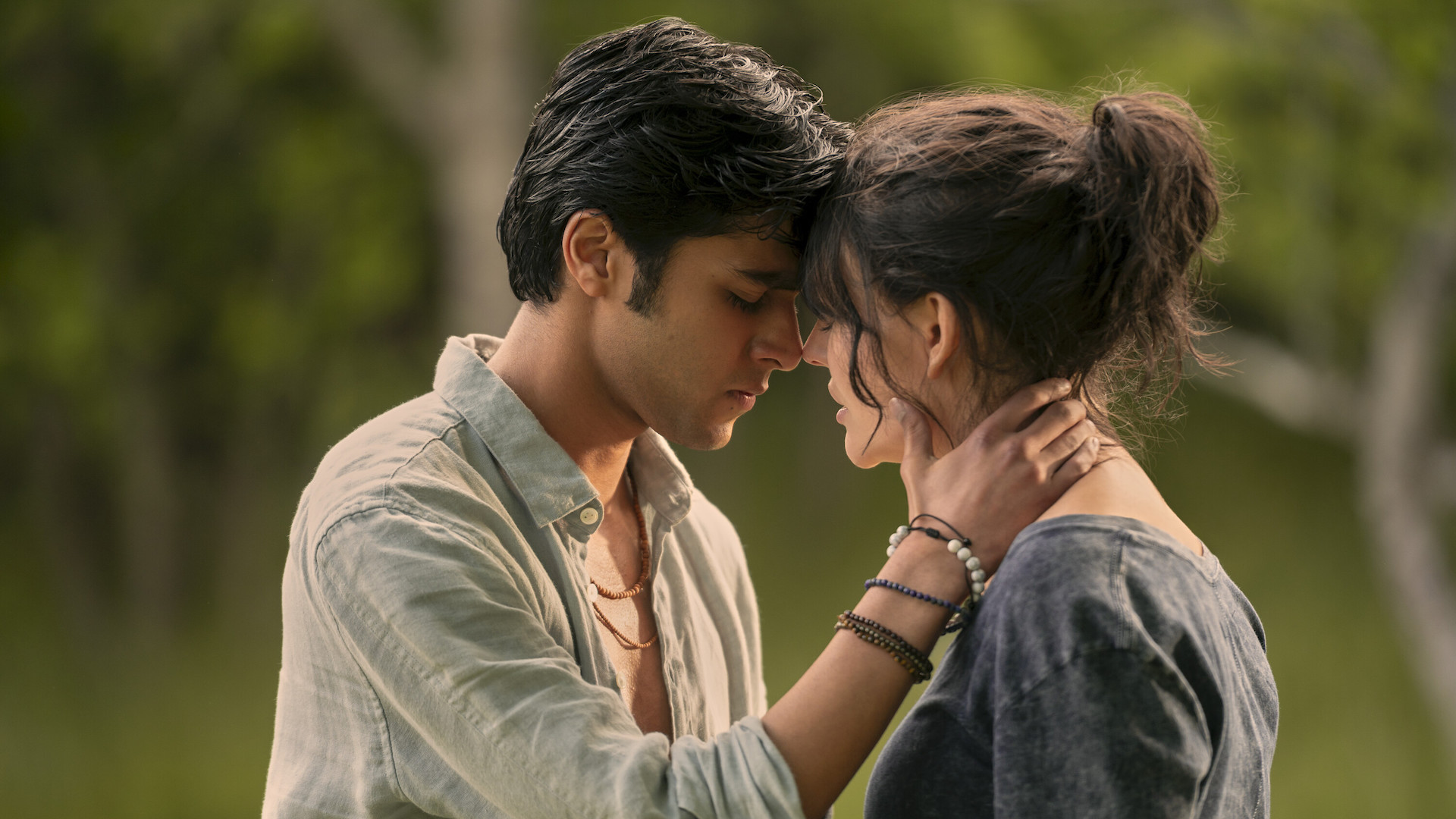 Two teens with their foreheads touching; Shubham Maheshwari and Emily Alyn Lind 'We Were Liars'