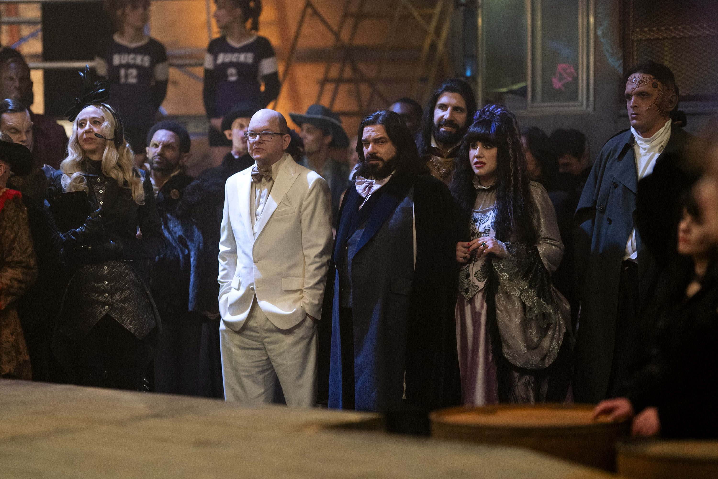 “WHAT WE DO IN THE SHADOWS” — “Come Out And Play” — Season 6, Episode 9 (Airs Dec 2nd) — Pictured: (l-r) Mark Proksch as Colin Robinson, Matt Berry as Laszlo, Natasia Demetriou as Nadja. CR: Russ Martin/FX