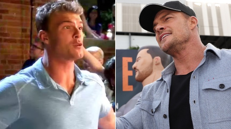 Thad Castle next to Alan Ritchson at Daytona 500 promo event outdoors pointing with Reacher banner behind