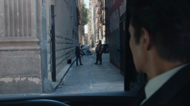 Front Man watching new recruiter playing in an alley (2025)