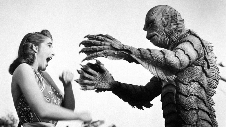 The Gill-Man attacks Kay Lawrence in "Creature from the Black Lagoon" (1954)