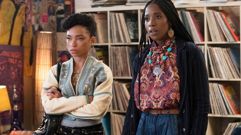 Sam and Joelle stand in front of record shelves in "Dear White People" (2017-2021)
