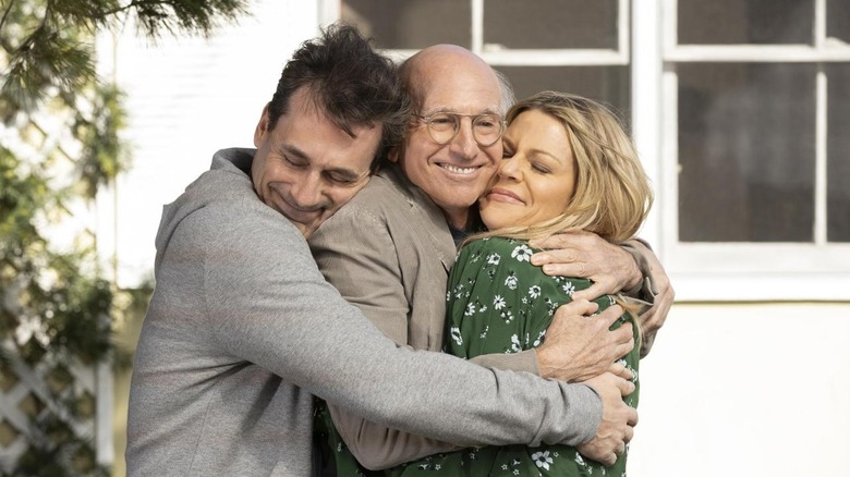 Larry and Jon Hamm hug Becky in "Elizabeth, Margaret and Larry"