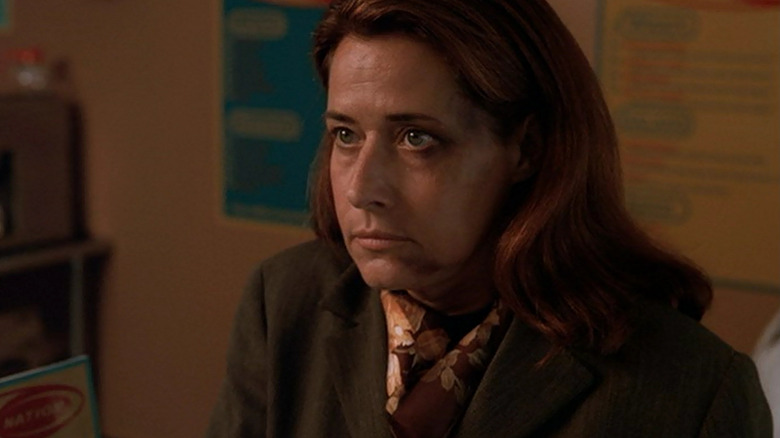 Jennifer Melfi sits in a doctors office in "Employee of the Month"