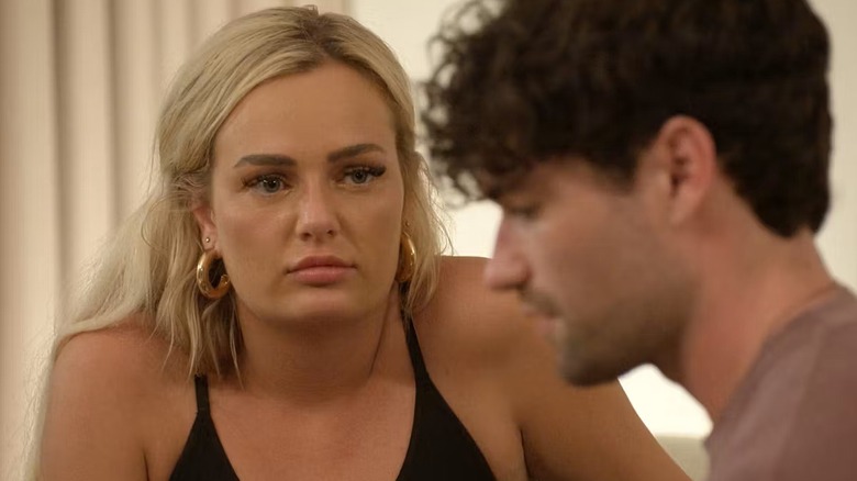 Micah stares at Paul as he talks on Love is Blind (2020)