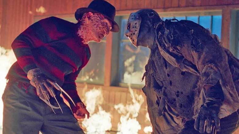 Freddy confronting Jason in a burning cabin in "Freddy Vs. Jason" (2003)