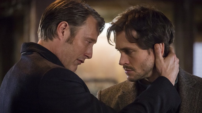 Hannibal grasping Will's neck in Hannibal