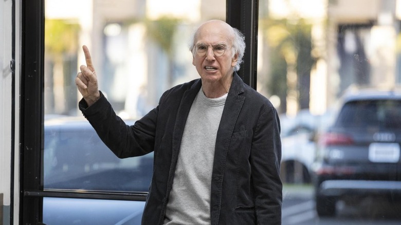 Larry argues with someone in "Happy New Year"