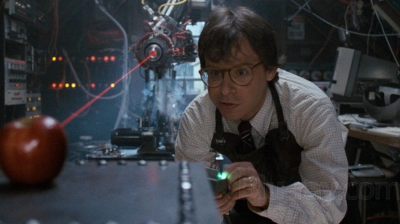 Wayne shoots a laser at an apple in "Honey, I Shrunk the Kids" (1989)