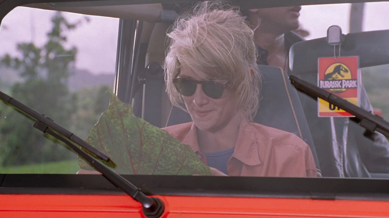 Ellie Sattler looking at a leaf in Jurassic Park