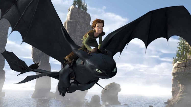 Hiccup rides Toothless through the skies in "How to Train Your Dragon" (2010)
