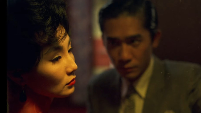 Chow looking at Su, whose face is turned away "In the Mood for Love" (2000)