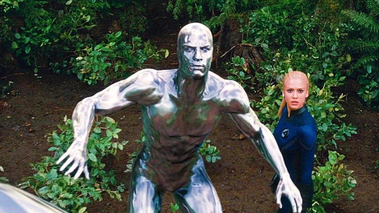 The Silver Surfer protects Sue Storm in "Fantastic Four: Rise of the Silver Surfer" (2007)