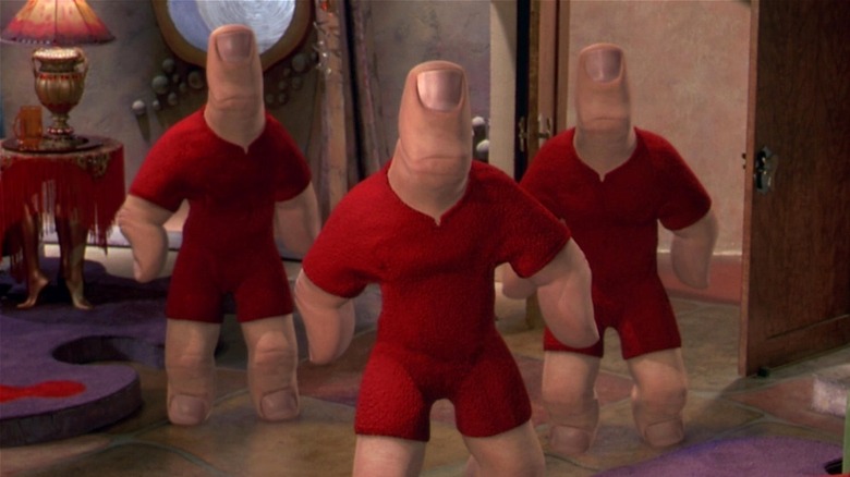 Three Thumb-Thumbs standing at attention in "Spy Kids"