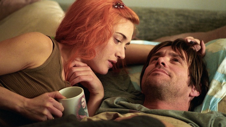 Clementine consoling Joel in bed in "Eternal Sunshine of the Spotless Mind" (2004)