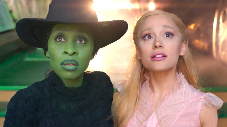 Elphaba and Galinda looking up together in "Wicked" (2024)