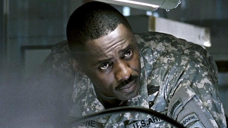 Stone in uniform looking straight ahead in "28 Weeks Later" (2007)
