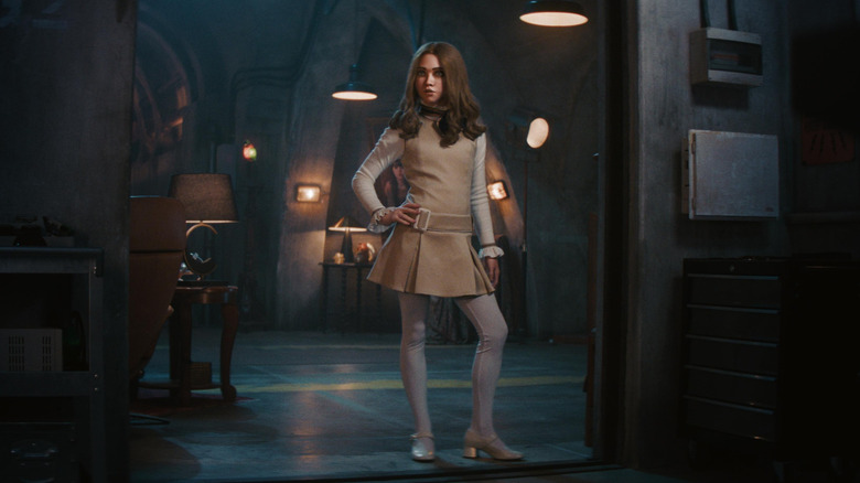 M3GAN stands with her hand on her hip in "M3GAN 2.0" (2025)