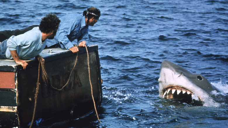 Hooper and Quint try to snare the great white shark in "Jaws" (1975)