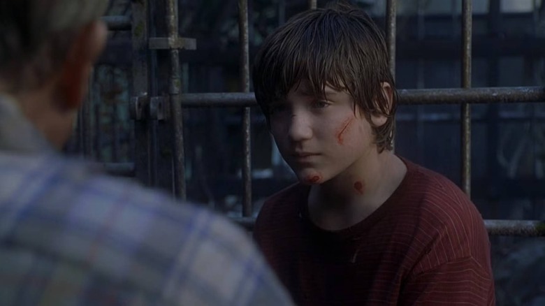 Eric Kirby with a cut on his cheek in Jurassic Park III