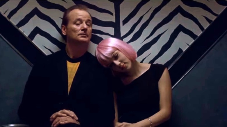 Charlotte rests her head on Bob's shoulder in "Lost in Translation" (2003)