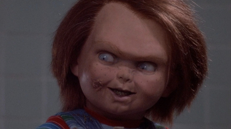 Chucky smirking in "Child's Play" (1988)