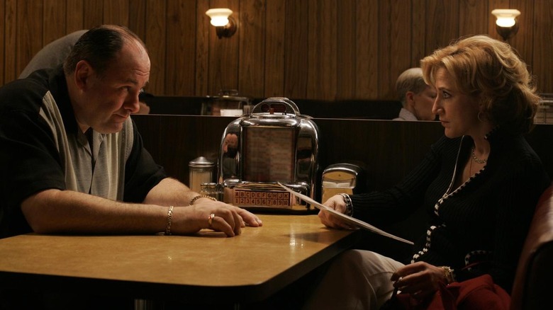 Tony and Carmela sit at a diner table in "Made in America"