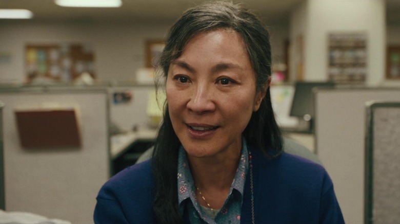 Evelyn Wang listening to an IRS meeting
