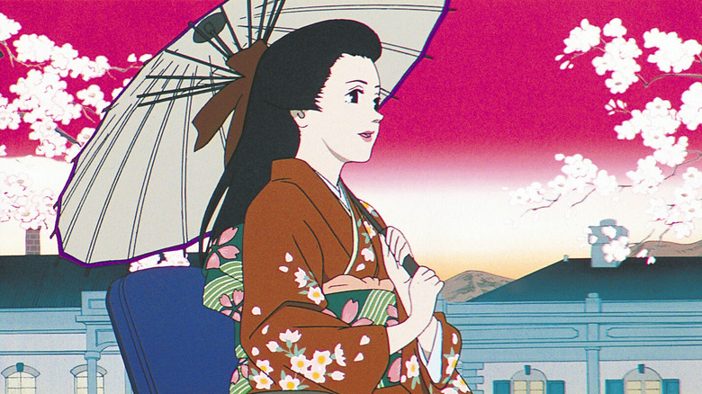 Chiyoko wears a kimono and holds a parasol in "MIllennium Actress"